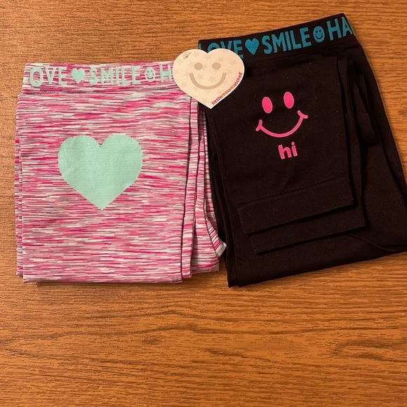 𝅺Two pair of little miss matched leggings. - Picture 2 of 11